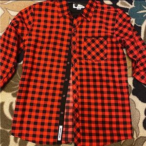 Selling as a bundle 4 button down boy shirts size 10/12.